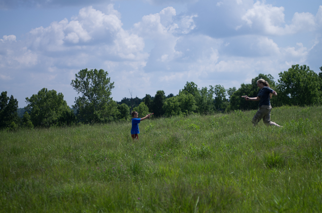 Bryce and Jennifer playing in the field