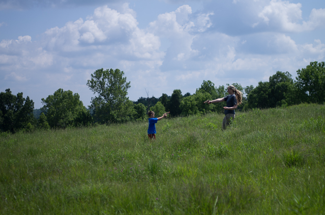 Bryce and Jennifer playing in the field