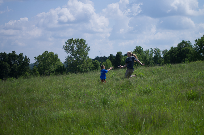 Bryce and Jennifer playing in the field