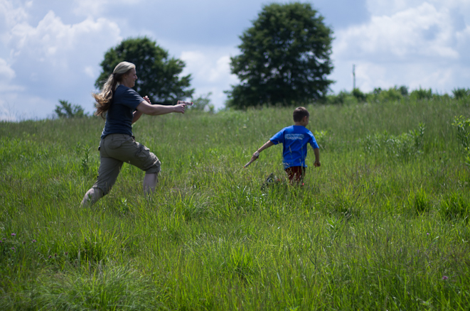 Bryce and Jennifer playing in the field