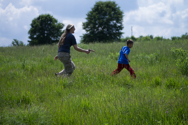 Bryce and Jennifer playing in the field