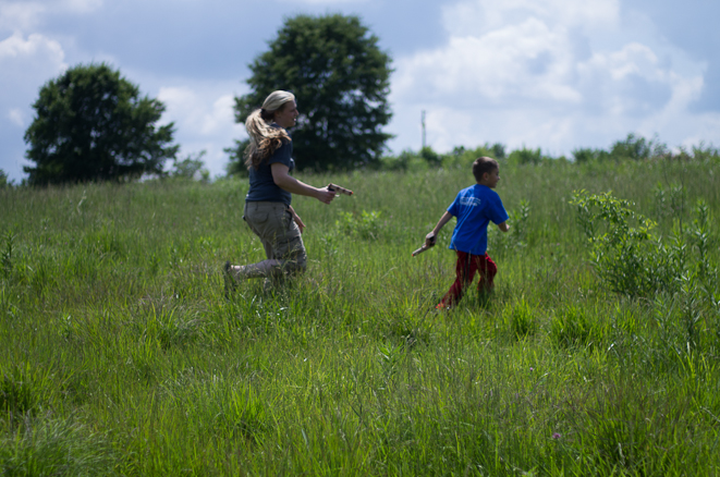 Bryce and Jennifer playing in the field