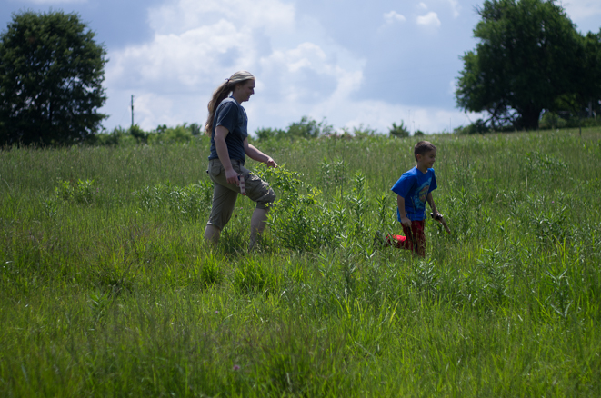 Bryce and Jennifer playing in the field