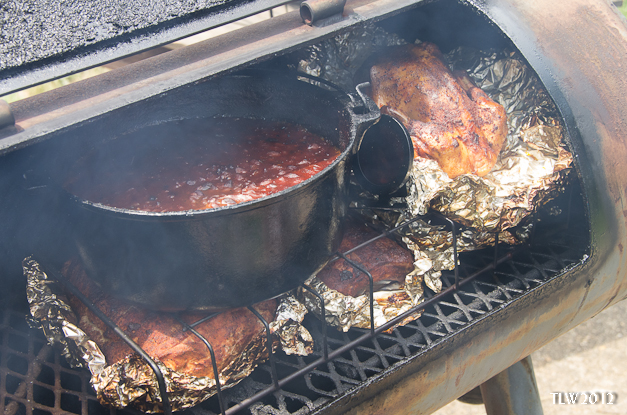 Dinner on the Smoker and NASCAR on the TV! It doesn't get any better than this! 3 hours into the process.