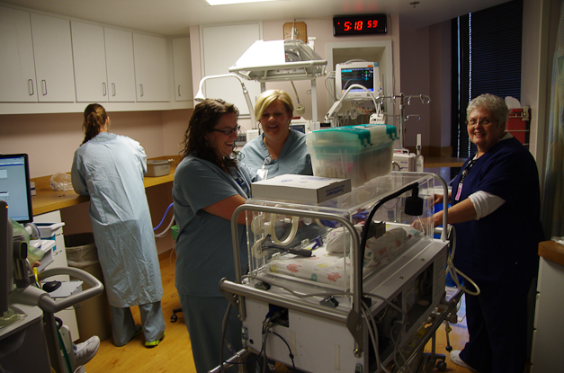 Here she's arriving at her space in the NICU. She was born at 5:09, so this is about 10 minutes after her birth. 