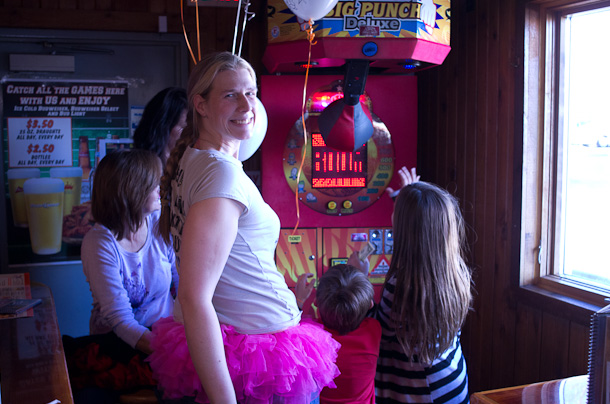 Jennifer and the kids playing the punching bag